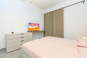 Ένα ή περισσότερα κρεβάτια σε δωμάτιο στο Sara Home