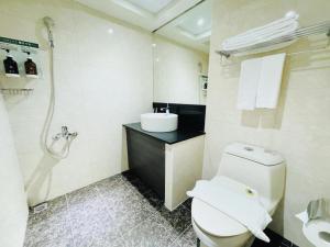 Koupelna v ubytování 丰居一中 Via Garden Hotel + 15 fotografií