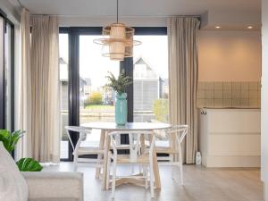 Χώρος καθιστικού στο Luxe Verblijf in een Waterlodge aan de Waterkant