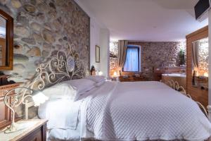 Ένα ή περισσότερα κρεβάτια σε δωμάτιο στο GardaBeds Adults Only +95 φωτογραφίες