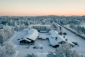 an aerial view of a building covered in snow at Laponia Hotell & Konferens in Arvidsjaur