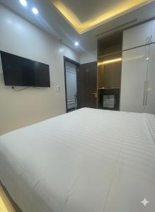 TV a/nebo společenská místnost v ubytování Six Brothers Boutique Hotel