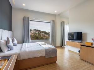Μια τηλεόραση ή/και κέντρο ψυχαγωγίας στο Gold View Boutique Hotel Đà Lạt