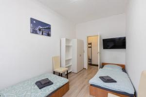 Ένα ή περισσότερα κρεβάτια σε δωμάτιο στο FLEX Aparts - möblierte Wohnung in Zwickau