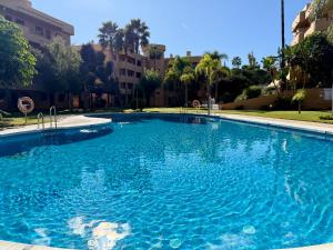 Swimmingpoolen hos eller tæt på Cozy Retreat near the sea