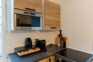 Η κουζίνα ή μικρή κουζίνα στο Nouveau sur dunkerque LE NID DU BEFFROI +18 φωτογραφίες