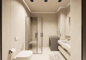 een witte badkamer met toilet en douche bij Havens Apartamen in Durrës