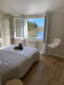 Postel nebo postele na pokoji v ubytování Ker Coeur