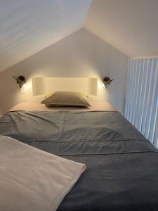 Postel nebo postele na pokoji v ubytování Ker Coeur