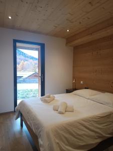 Ένα ή περισσότερα κρεβάτια σε δωμάτιο στο Chalet Kelly