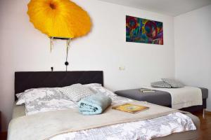 Postel nebo postele na pokoji v ubytování Sobe - Rooms Stremljan Ljubljana