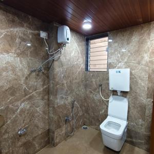 Ένα μπάνιο στο Sai Srushti Residency