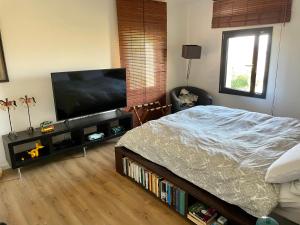 Ένα ή περισσότερα κρεβάτια σε δωμάτιο στο Villa Julieta-casolare di campagna recentemente ristrutturato +15 φωτογραφίες