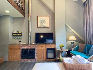 TV a/nebo společenská místnost v ubytování Puli Story House