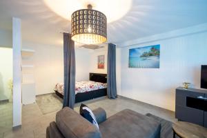 Et tv og/eller underholdning på Relax & Stay Apartment + 5 billeder