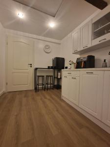 Η κουζίνα ή μικρή κουζίνα στο Janna's City Appartement