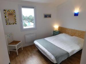 En eller flere senge i et værelse på La maison bleue - Bretignolles sur Mer + 11 billeder