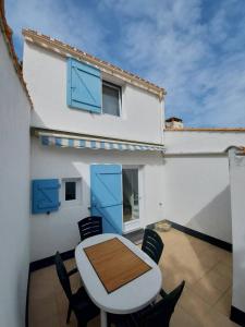 En balkon eller terrasse på La maison bleue - Bretignolles sur Mer