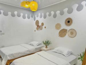 Ένα ή περισσότερα κρεβάτια σε δωμάτιο στο The Mountain Homestay & Cafe