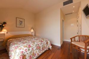 Кровать или кровати в номере Hotel Puerta Gamboa