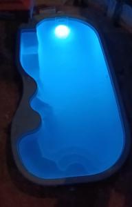 Πισίνα στο ή κοντά στο Cantinho Familiar a 10 minutos do Aeroporto