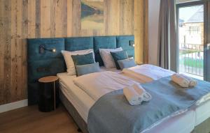 Postel nebo postele na pokoji v ubytování Chalet Nähe Afritzsee + 16 fotografií