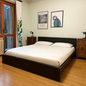 Ένα ή περισσότερα κρεβάτια σε δωμάτιο στο Giuditta Apartment