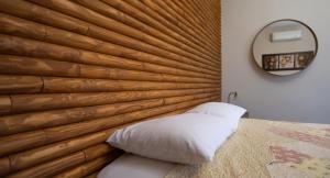 En eller flere senge i et værelse på Pozar Park Rooms