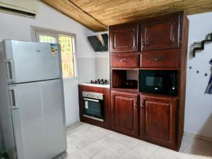 Kuchyň nebo kuchyňský kout v ubytování Safari