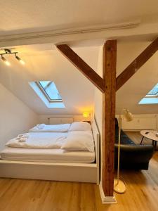 Ένα ή περισσότερα κρεβάτια σε δωμάτιο στο Stilvolles Studio-Apartment in Zentrumsnähe