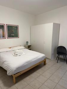 Ένα ή περισσότερα κρεβάτια σε δωμάτιο στο Giuditta Room