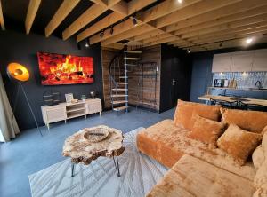 Χώρος καθιστικού στο Czarne Domki Krempna