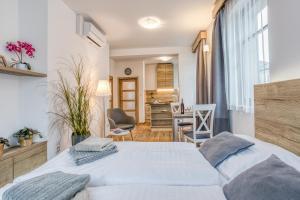 Postel nebo postele na pokoji v ubytování Apartmány U Holubů