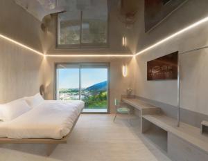 Postel nebo postele na pokoji v ubytování Le Stele Hotel