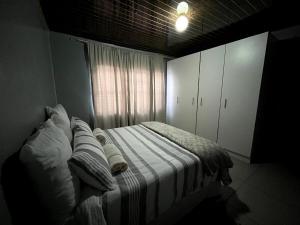 En eller flere senge i et værelse på Cozy Comfort