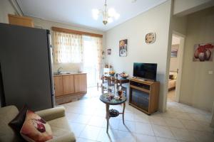 TV a/nebo společenská místnost v ubytování Neossia - Tripoli City Escape