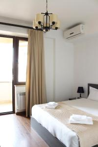 Giường trong phòng chung tại Domel Yerevan Buzand 17