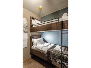 Postel nebo postele na pokoji v ubytování Stötens Stugor & Lägenheter