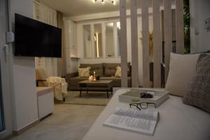 Μια τηλεόραση ή/και κέντρο ψυχαγωγίας στο Apartman P Lux 2 Ćuprija