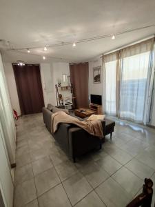 Ένα ή περισσότερα κρεβάτια σε δωμάτιο στο Essential Near stadium Air conditioning et Private parking