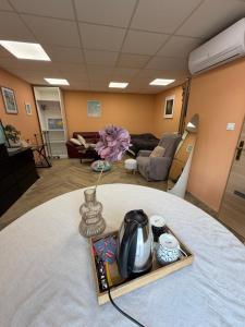 Χώρος καθιστικού στο Chambre privée avec salle de bain