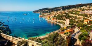 a view of a harbor with boats in the water at Golden hours luxury and panoramic view in Nice