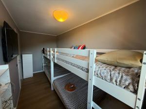 เตียงในห้องที่ Attico del Sole sulle piste da sci - Box privato