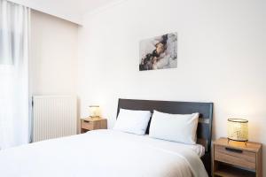 Ένα ή περισσότερα κρεβάτια σε δωμάτιο στο Houseloft Urban Retreat