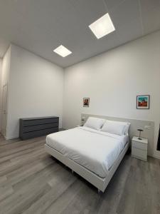 Ένα ή περισσότερα κρεβάτια σε δωμάτιο στο Viva Residence +11 φωτογραφίες