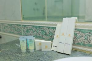 a group of products sitting on a counter in a bathroom at Majestic BnB in Karachi +54 photos