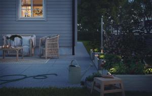 a patio with a table and chairs and a window at 2 Bedroom Amazing Home In Färjestaden in Algutsrum +4 photos