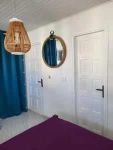 Ένα ή περισσότερα κρεβάτια σε δωμάτιο στο Appartement lumineux avec terrasse à Les Trois-Îlets