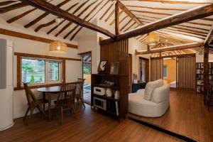 a living room with a table and a chair at 고요별서 goyobyeolseo 