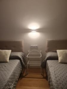 Ένα ή περισσότερα κρεβάτια σε δωμάτιο στο Casa Mauricio